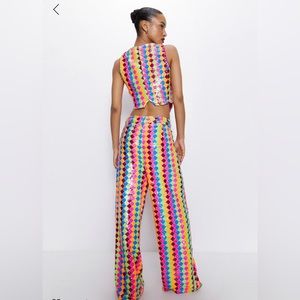 Wide leg, bright, sequin pants!!  You cannot get them anymore w/o buying vest
